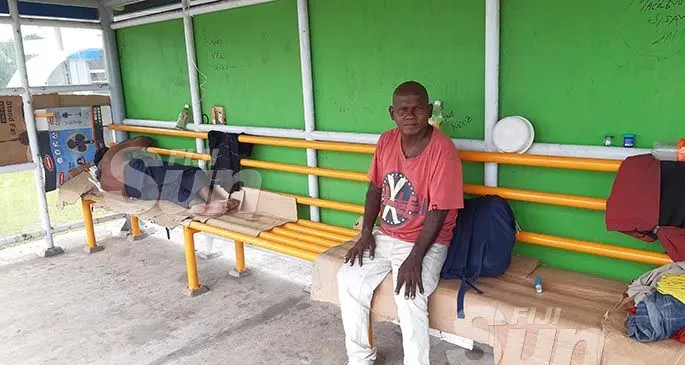 Jope Teimanoa, 47, and his friend at the bus shelter along Jerusalem Road in Suva. Photo: Shalveen Chand