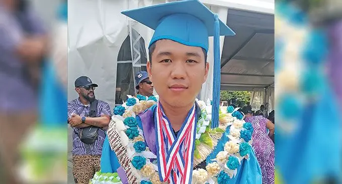 Tony Chan with his spoils after the University of Fiji graduation on November 29, 2024. Photo: Mereleki Nai
