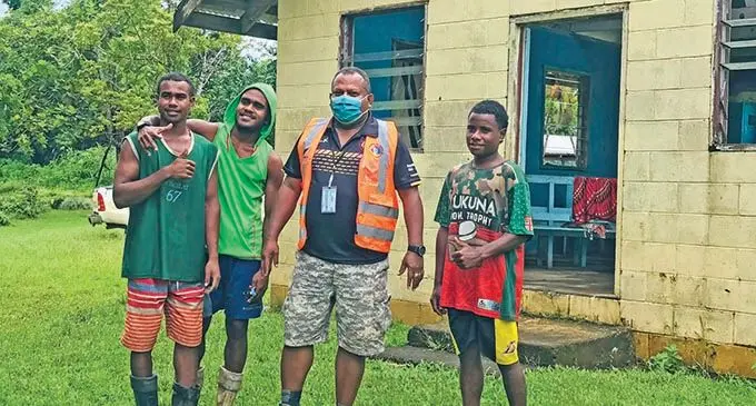 Minister for Natural Disaster and Management Inia Seruiratu with the people of Wavu Village on January 15,2022 infront of their Church that was affected during Tropical Cyclone Yasa in 2019. Photo: Laisa Lui.