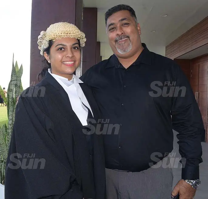 Faiyaz Saheb congratulate his daughter, Shahista Saheb following her admission to the Bar by Acting Chief Justice Kamal Kumar at GPH on August 7, 2020. Photo: Ronald Kumar.