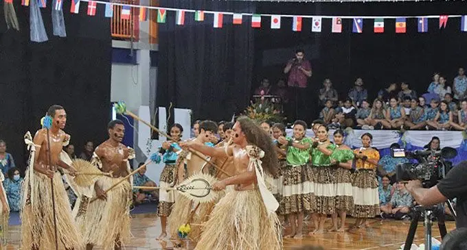 International School Suva students perform a traditional Fijian dance during the celebration on July 21, 2023