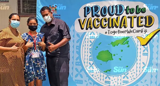 Tilak High School student, Ashley Chand with her parents, Rina and Pravind after receiving her Pfizer jab at Saint Thomas Primary School in Lautoka on November 16, 2021. Photo: Nicolette Chambers