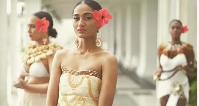 Wearing Fiji models during a photoshoot at Suva’s Grand Pacific Hotel.