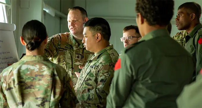 U.S. and Fiji service members discuss peacekeeping topics, including rules of engagement and protection of civilians, during Khaan Quest 2019 at Five Hills Training Area, Ulaanbaatar, Mongolia, June 14, 2019. Photo: U.S. Marine Corps, Lance Cpl. Kindo Go