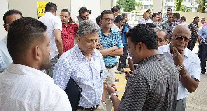 Bus operators in Suva before their meeting with the chairperson of the Independent Bus Fare Review Committee, Joel Abraham, on February 6, 2016.  Photo: Ronald Kumar