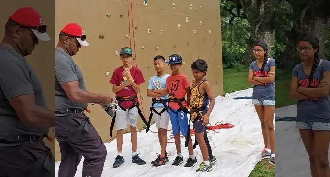 Manasa Daunakamakama (left) with children at his facility in Nausori