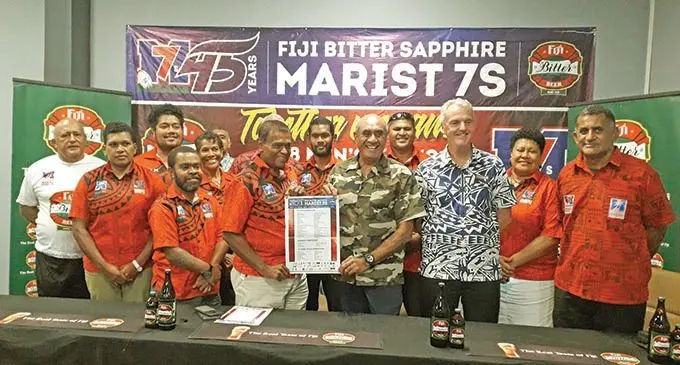 Marist Rugby Club president, Lawrence Tikaram (front 4th from left), and Paradise Beverages General managersales and cooperate affairs, Joe Rodan Snr, General Manager, Michael Spencer and Fiji Bitter Marist 7s coordinator, Koli Korovulavula during the launching in Suva on March 15, 2021 . Photo: Sereana Salalo