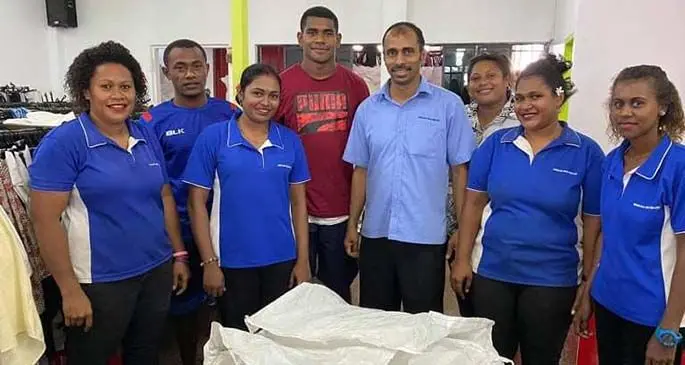 Hakwa Foundation reps from left Selita Donu, Newa Sotia, Eliki Naqau with Fiji Airways Fiji 7s forward Apenisa Cakaubalavu.