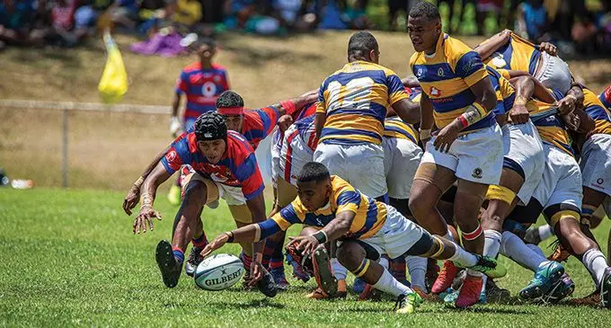 Ratu Kadavulevu School Under-17 halfback Jone Lee (right) goes for the ball against Marist Brothers High School in their semi-final clash at Prince Charles Park, Nadi, on October 2, 2022. MBHS won 32-3. Photo: Leon Lord