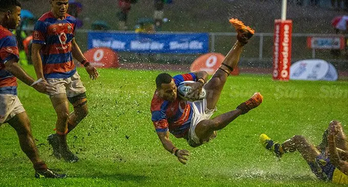 Marist Brothers High School fullback Brendan Saun takes a clean clash against Suva Grammar School at Church Park, Lautoka, tonight. Photo: Leon Lord 