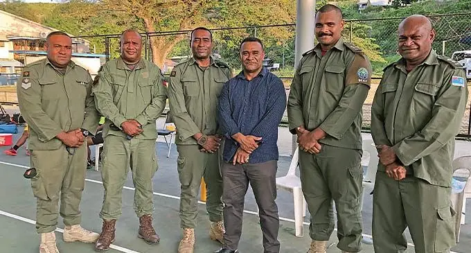 From left: Republic of Fiji Military Forces staff sergeants Anitelu Natoga, Eliki Seasea, Warrant Officer 2 Mikaele Koroi, Reverend Nacanieli Serua, Lieutenant Jerome Taoi, Commanding Officer Lieutenant-Colonel Asaeli Toanikeve in Honiara.