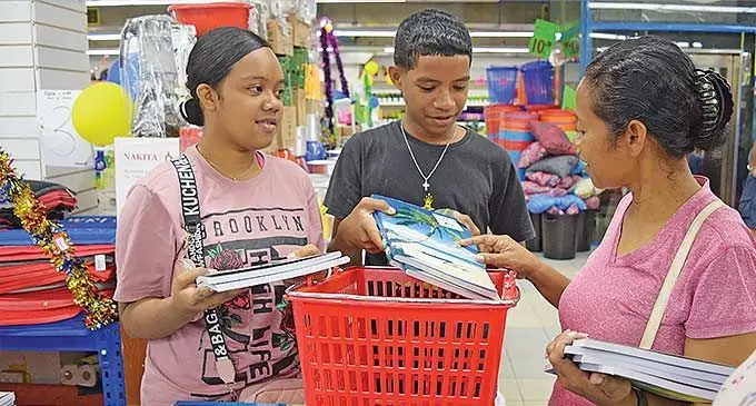 Miri Kelevi (right), with her children, Elizabeth Kelevi and Caleb Benjamin, during the back to school shopping in Suva on December 28, 2023. Photo: Ronald Kumar