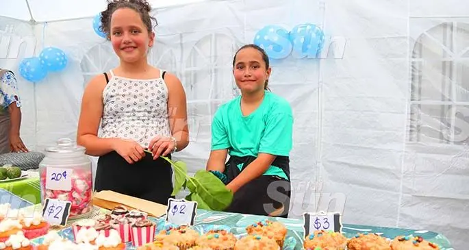 From left: Iris Bentely and Scarlet Fisher at their stall on February 8, 2020. Photo: Kelera Sovasiga