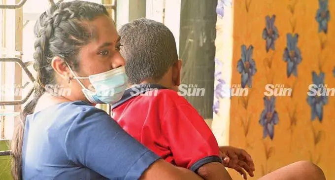 Suva Special School teacher, Sanjivni Narayan, restrains a student on March 10, 2022.  Photo: Ronald Kumar