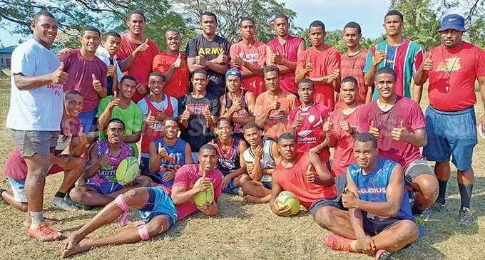 Natabua High School Under-18 coach, Raikiwasa Loanakadavu (right) with the team’s captain, Tomasi Tuitatava (left) and the players following their training session in Lautoka on September 5, 2022 win. Photo: Nicolette Chambers