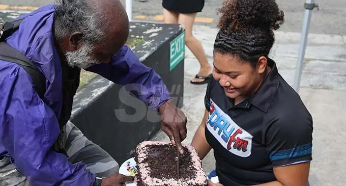 Jope Tuimaitoga cuts his birthday cake. Photos: Jennis Naidu