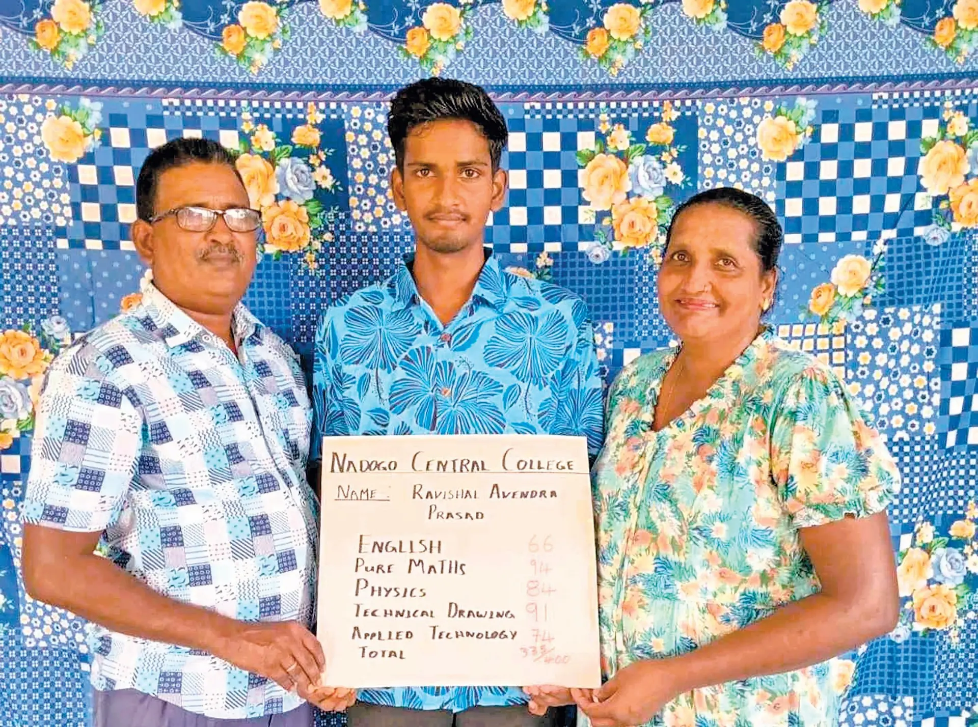 Nadogo Central College Year 13 student Ravishal Prasad with parents show his outstanding Fiji Year 13 Certificate (FY13CE) marks at his home in Daku, Labasa on December 19, 2025. 