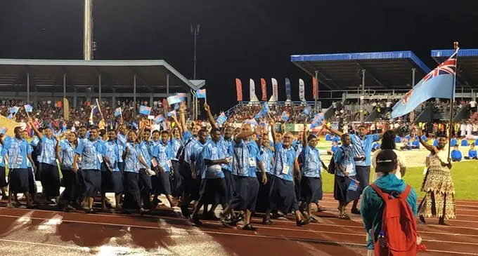 Team Fiji contingent led by flag bearer Roy Krishna during the opening of the Pacific Games in Apia, Samoa on July 7, 2019. Photo: Rosi Doviverata