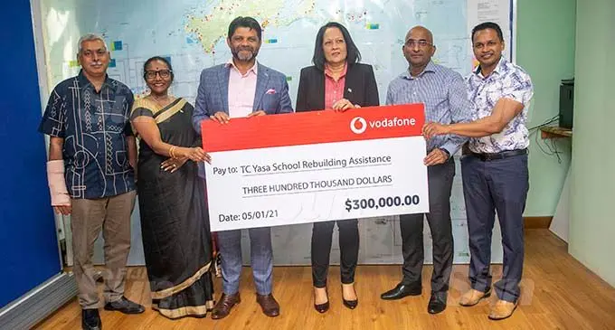 From left: Head of Construction Implementation Unit Mohammed Intaz Shah, Permanent Secretary for Education Anjeela Jokhan, Attorney General and Minister for Economy Aiyaz Sayed-Khaiyum, Minister for Education Rosy Akbar, Vodafone Fiji Regional CEO Pradeep Lal and Vodafone Fiji Marketing Director Rajnesh Prasad after the handover $300,000 cheque in Suva on the January 5, 2021. Photo: Leon Lord