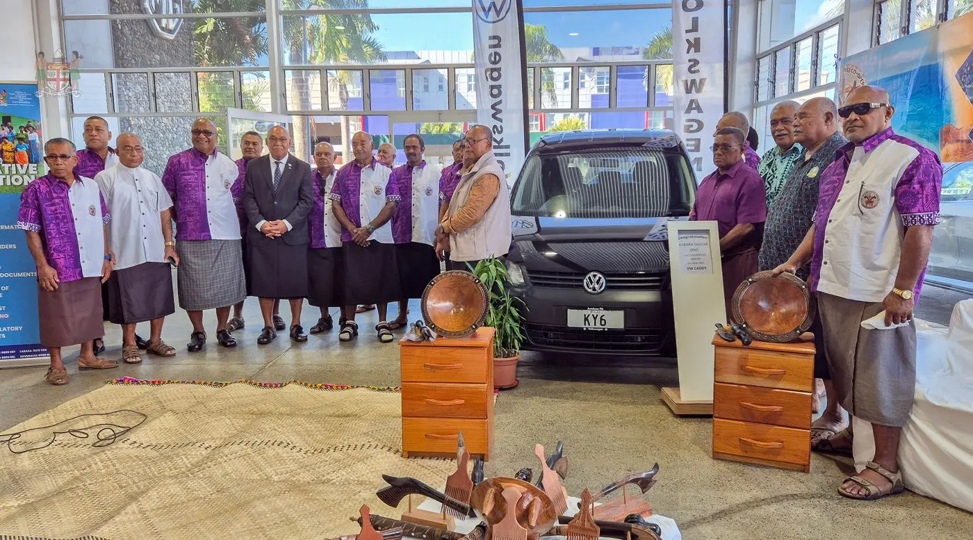 Kabara Yavusa Ono Cooperative members with Deputy Prime Minister Manoa Kamikamica (fourth from left) and Speaker of Parliament, Filimone Jitoko (centre).