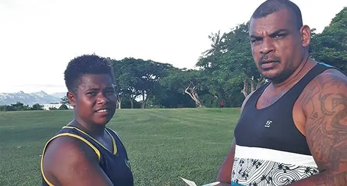 Fijiana 7s and XVs winger Wainikiti Deku (left) seals the deal with South Pacific Boxing promoter Freddy Chand in Nadi. Deku will fight against Katrina Singh in a 4x2 mins round in Lautoka on April 13. Photo: Supplied by Freddy Chand