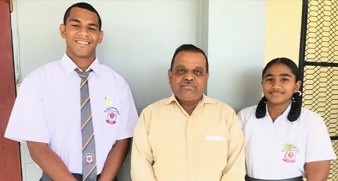 All Saints Secondary School newly inducted head boy James Bull with principal Kamlesh Prasad and head girl Shweya Gounder in Labasa on March 9, 2023. Photo: Shratika Naidu