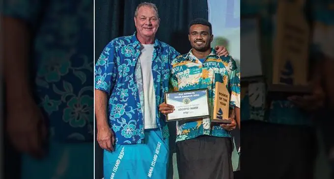 Head coach Mick Byrne (left) with Iosefo Masi with his FijiCare Rookie of the Year Award. Photo: Leon Lord