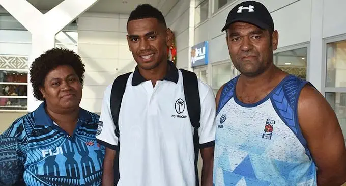 Kitione Salawa Jnr (middle) with his parents, Vani and Salawa Snr, December 15, 2019. Photo: Waisea Nasokia