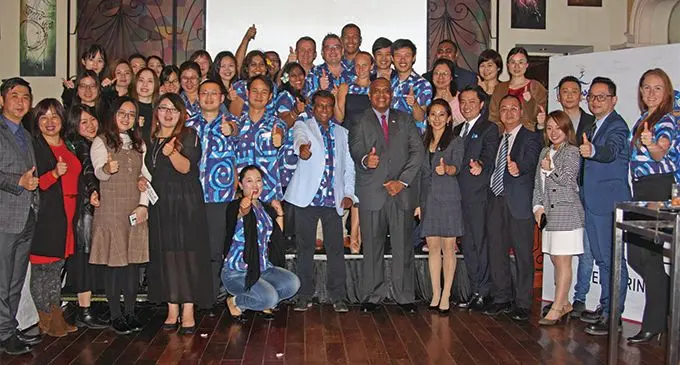 Tour Managers staff with Fiji Ambassador to China, Manasa Tagicakibau.