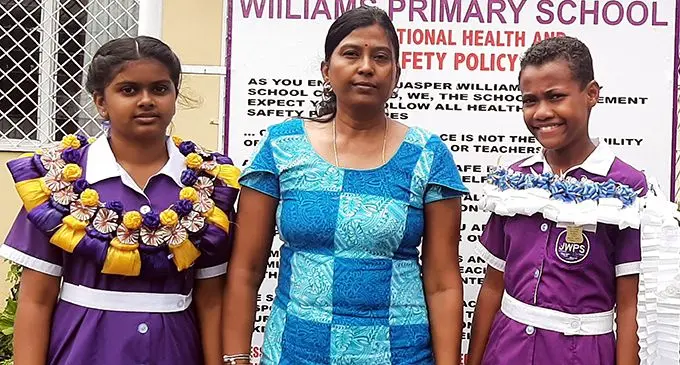 Jasper Williams Primary School Head girls Annabel Pillay (left) and Emali Tokadua with the school head teacher Lalita Kumar.   Photo: Salote Qalubau