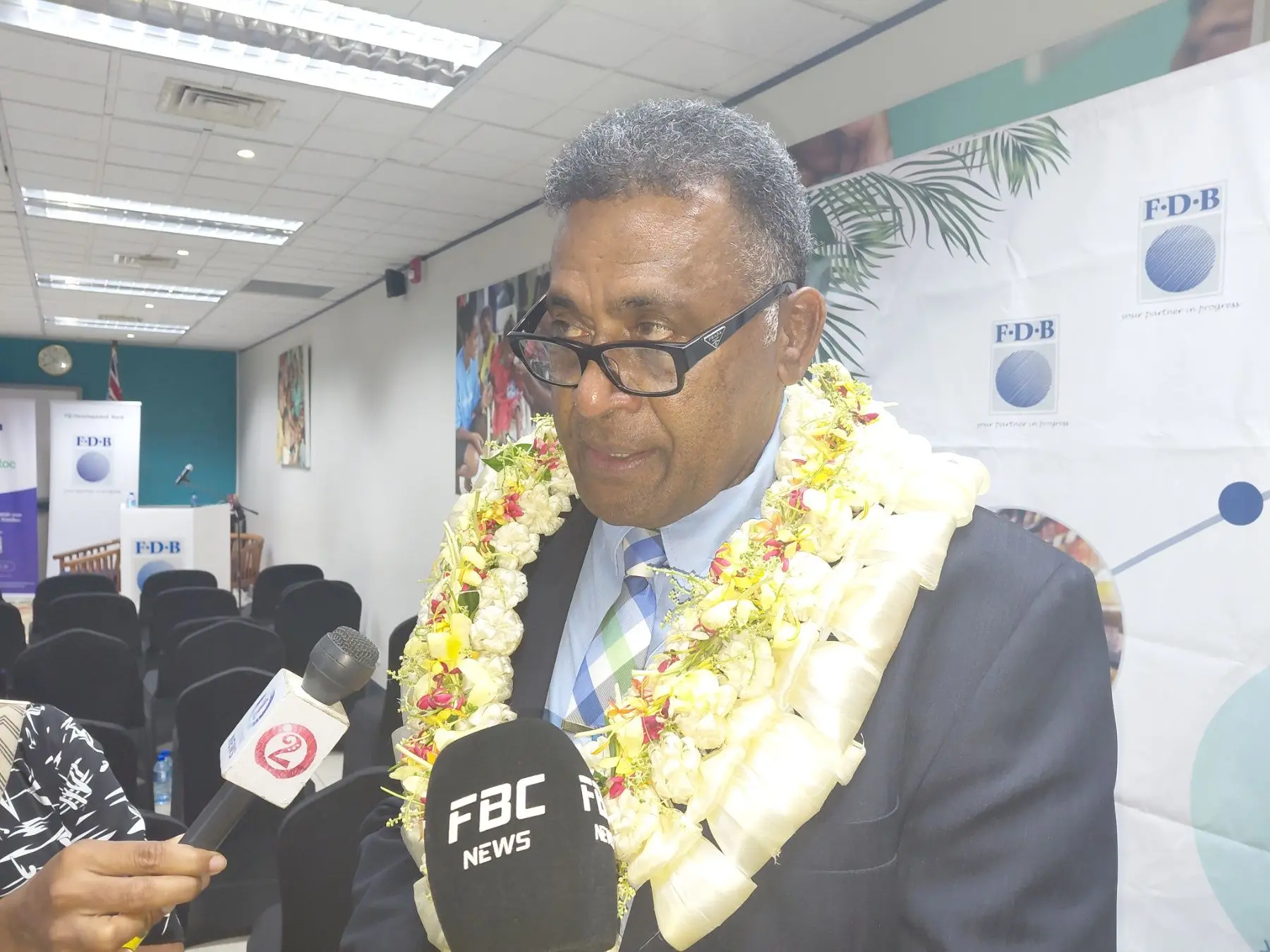 Minister for Finance Esrom Immanuel speaks to reporters after the launch of Fiji's First AI Credit Assessment Pilot Project for Unsecured Lending in Suva on November 13, 2025.