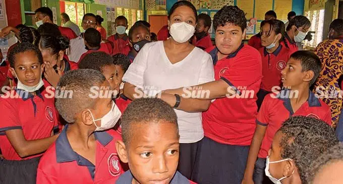 Suva Special School student, Wendy Halo with Minister for Education Premila Kumar and fellow students following the computer set donation on March 10, 2022. Photo: Ronald Kumar