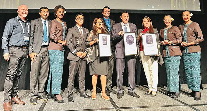 Fiji Airways managing director and chief executive officer Andre Viljoen (7th from left) after winning the 2023 Passenger Choice Award for Best Food & Beverage and Seat Comfort, South Pacific. Photo: Fiji Airways