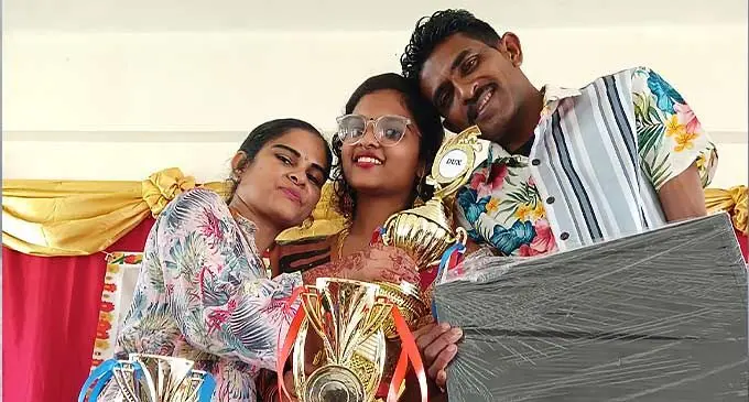 Pt Shreedar College dux Riya Maniam with her parents. Photo: Maikeli Seru