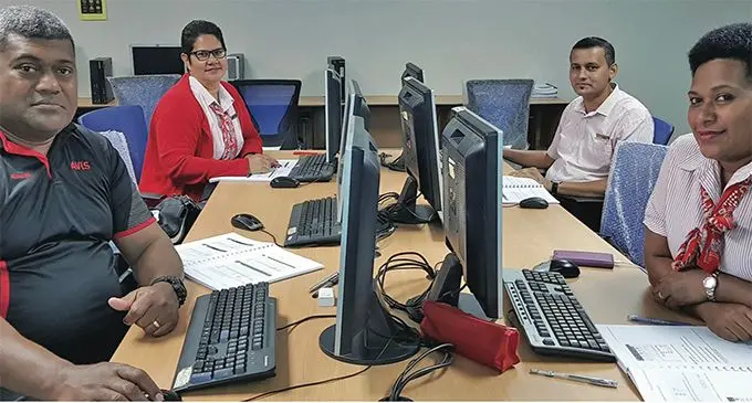 An in-house training on IT programmes with the ASCO Motors team in Nadi last year. Photo: Fiji National University