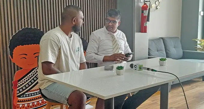 Cruiserweight boxer Sebastian Singh (left).