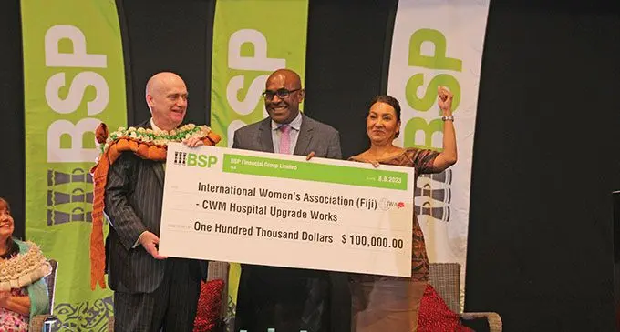 From left: BSP Group chief executive Mark Robinson, Minister for Health and Medical Services Ratu Atonio Lalabalavu, IWA President Judy Compain during the cheque handover at the recent BSP Cocktail held at the GPH on Tuesday, August 8, 2023.. Photo: BSP Group