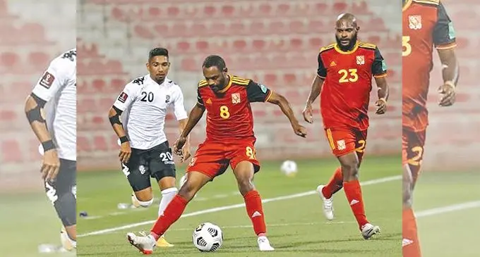 Digicel Fijian football midfielder Ashnil Raju runs back to challenge Papua New Guinea’s Michael Foster at the Grand Hamad Stadium in Doha on March 24, 2022. Photo: OFC Media