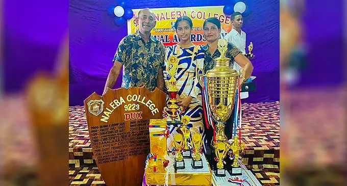 Naleba College dux Nishal Chand with her parents Jahendra Lal and Nilam Devi in Labasa on December 9, 2022.