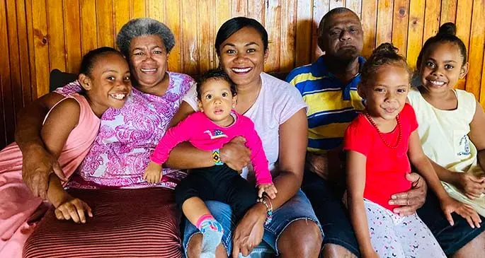 Siteri Navia (centre) with her mother Litia Navia and father Moape Navia and her nieces at their home in Suva.