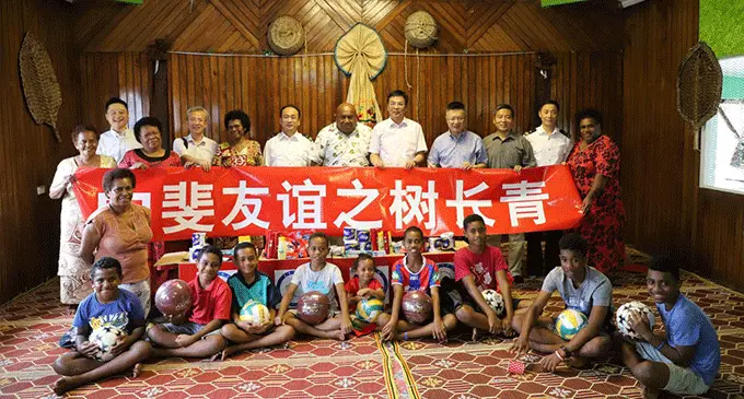 Crew members of Yuanwang-7 visited Tamavua village on December 13, 2019.