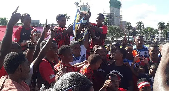 Naqarani players with the Digicel Koroturaga Cup at Albert Park, Suva, today. Photo: Sereana Salalo