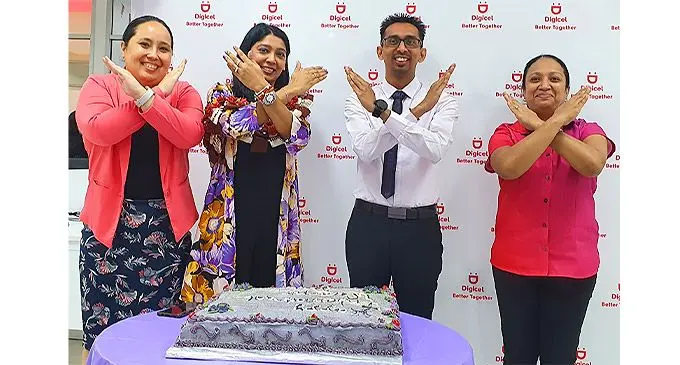 Digicel Fiji chief executive officer Farid Mohammed (third from left), with executive and women leaders showing solidarity with Breaking the Bias sign pose during the celebration on March 8, 2022.