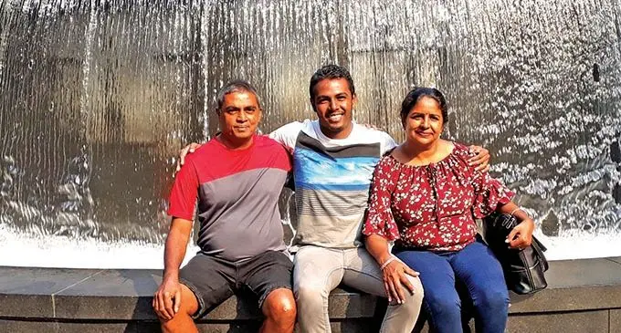 Nitish Deo (middle) pictured alongside his father Satish Deo and retired mother Nirmala Wati during a family occasion.