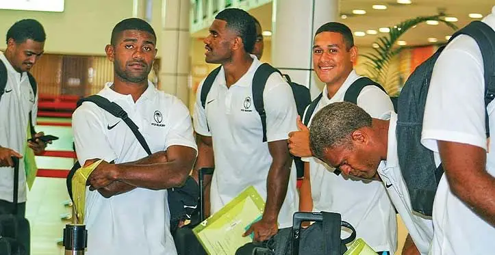 Fijian Warriors captain Enele Malele (bowing right) with teamamates at the Nadi International Airport on April 30, 2023. Photo: FRU Media