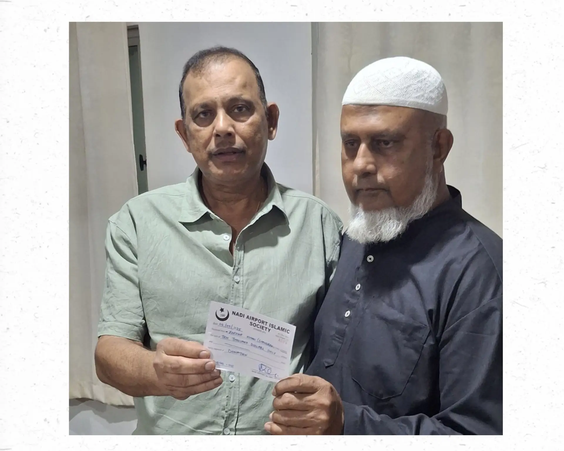  Chandrika Prasad with Nadi Airport Masjid president Abdul Saheed.