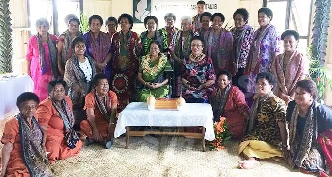 Indian High Commissioner to Fiji Ms Padmaja (wearing garland) with members of the Soqosoqo Vakamarama iTaukei at Nabua on August 26, 2020. Inset: High Commissioner Padmaja places a scarf as a farewell gift on one of the women. Photos: Sheenal Charan