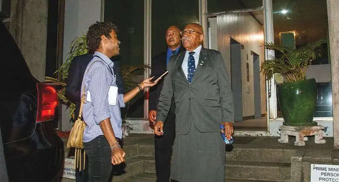 Prime Minister Sitiveni Rabuka (right) outside his office at Government Building, Suva, on December 24, 2022. Photo: Leon Lord