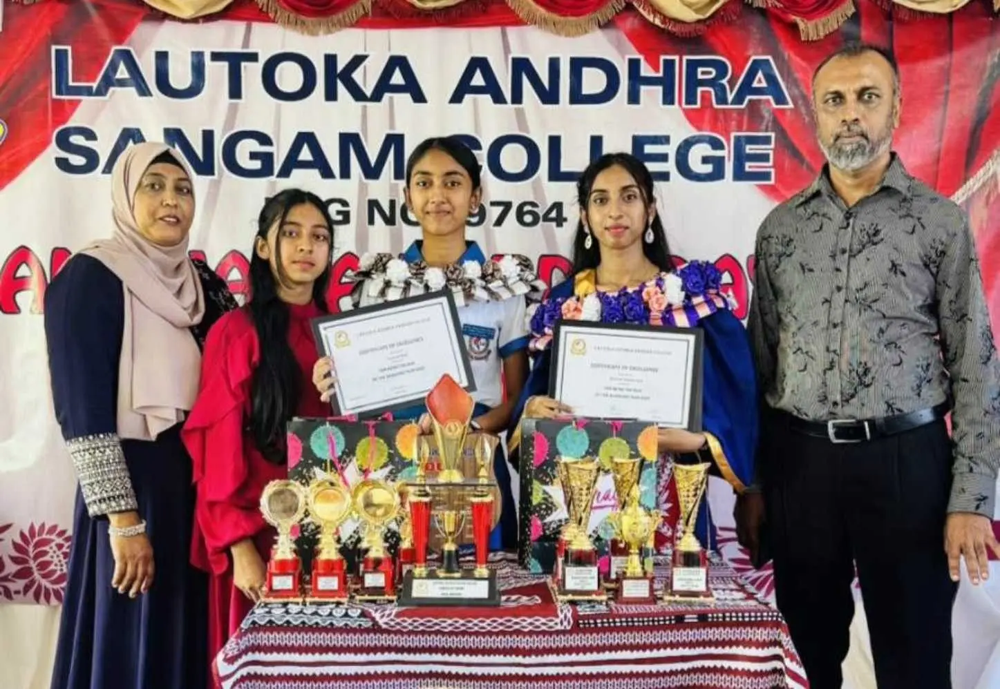 Mahira Shah (fourth from the left) pictured with her mother Nazmin Shah and sister Naira Shah, celebrates her remarkable achievements and looks forward to her journey in medicine.