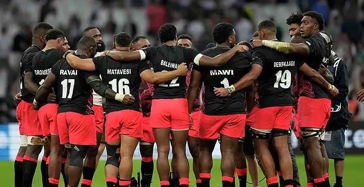 Fiji's players hug at the end of the Rugby World Cup quarterfinal match between England and Fiji at the Stade de Marseille in Marseille, France, Sunday on October 15, 2023. Photo: Pavel Golovkin/AP